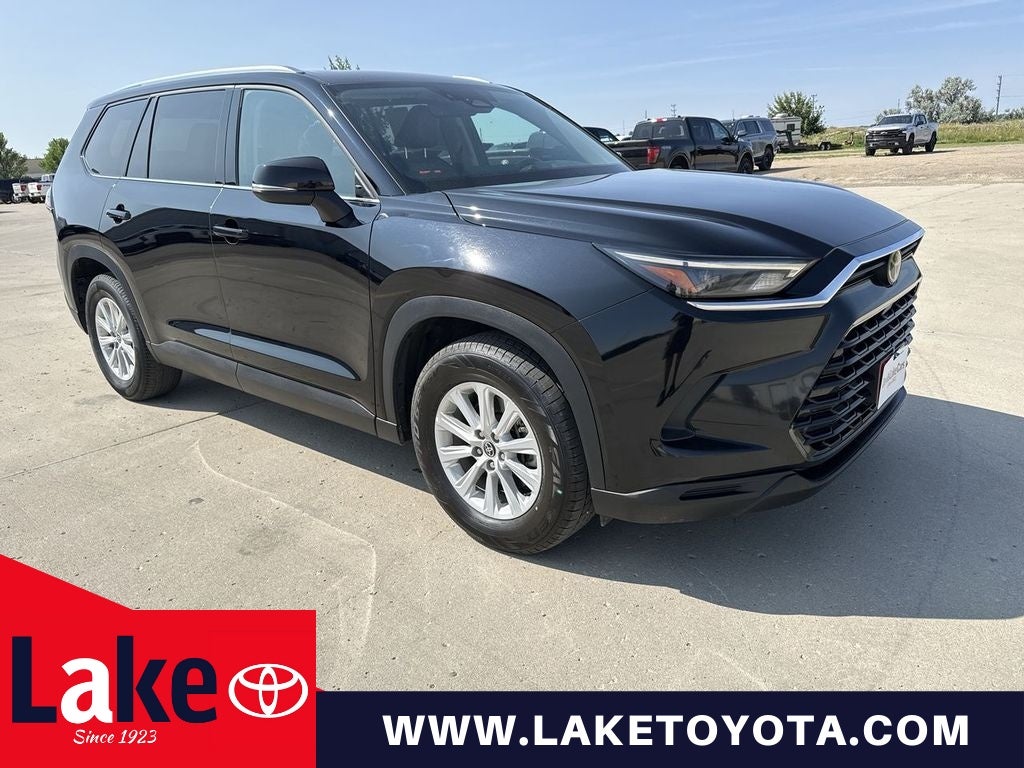 2025 Toyota Grand Highlander Base in Black — front three-quarter view